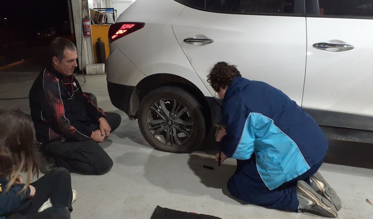 Murray Bridge Girl Guides learning to change a tyre.